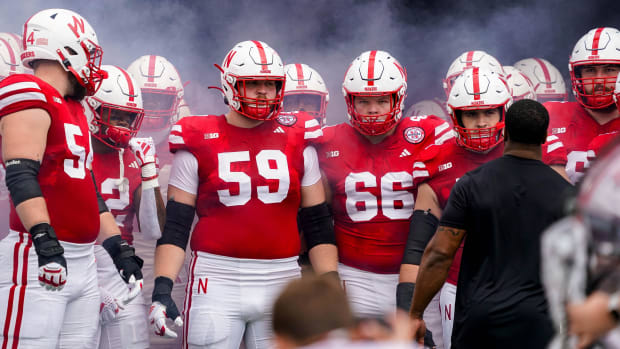 Nebraska Cornhuskers offensive lineman Bryce Benhart (54), offensive lineman Henry Lutovsky (59)