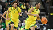 Dec 8, 2024; Eugene, Oregon, USA; Oregon Ducks guard TJ Bamba (5) dribbles the ball during the first half against the UCLA Bruins at Matthew Knight Arena. Mandatory Credit: Craig Strobeck-Imagn Images