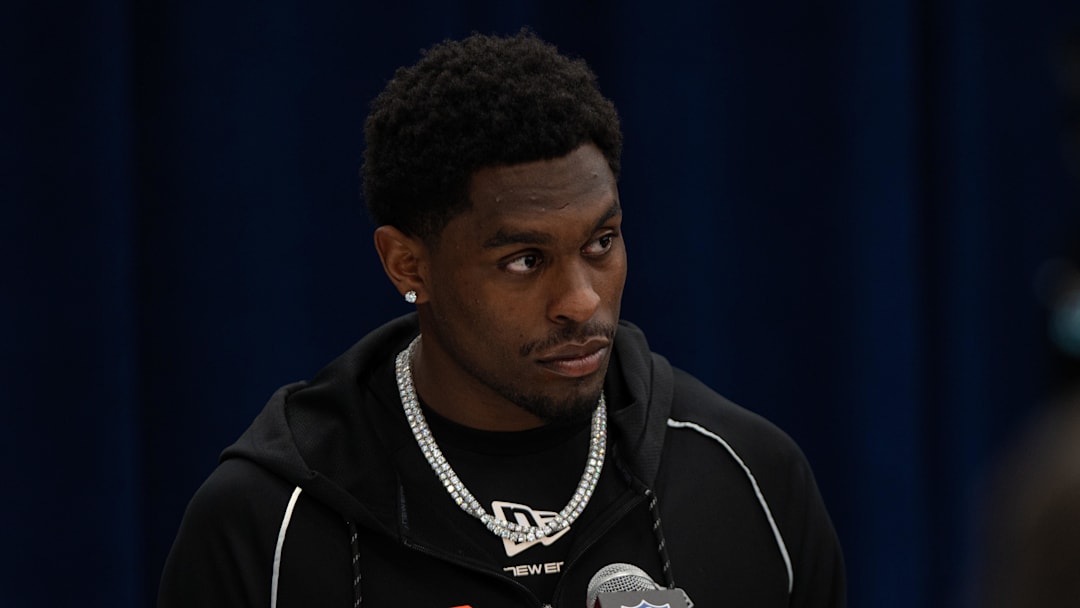 Feb 27, 2026; Indianapolis, IN, USA; Oregon wideout Malik Benson (W006) speaks to members of the media during the NFL Combine at the Indiana Convention Center. 