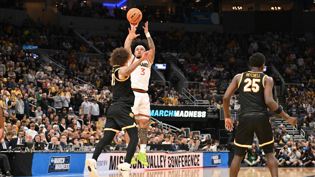 Mar 20, 2026; St. Louis, MO, USA; Miami (FL) Hurricanes guard Tre Donaldson (3) shoots for the basket during the second half against the Missouri Tigers during a first round game of the men's 2026 NCAA Tournament at Enterprise Center. Mandatory Credit: Jeff Curry-Imagn Images Mar 20, 2026; St. Louis, MO, USA; Miami (FL) Hurricanes guard Tre Donaldson (3) shoots for the basket during the second half against the Missouri Tigers during a first round game of the men's 2026 NCAA Tournament at Enterprise Center. Mandatory Credit: Jeff Curry-Imagn Images