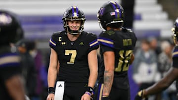 Nov 15, 2024; Seattle, Washington, USA; Washington Huskies quarterback Will Rogers (7) during warmups before the game against the UCLA Bruins at Alaska Airlines Field at Husky Stadium. Mandatory Credit: Steven Bisig-Imagn Images