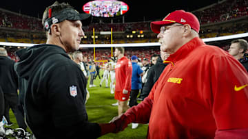 Oct 7, 2024; Kansas City, Missouri, USA; New Orleans Saints head coach Dennis Allen greets Kansas City Chiefs head coach Andy Reid after a game at GEHA Field at Arrowhead Stadium. Mandatory Credit: Jay Biggerstaff-Imagn Images