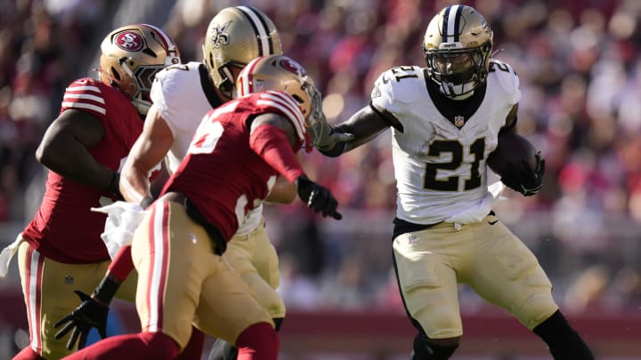 August 18, 2024; Santa Clara, California, USA; New Orleans Saints running back Jamaal Williams (21) runs the football against the San Francisco 49ers during the first quarter at Levi's Stadium. Mandatory Credit: Kyle Terada-USA TODAY Sports