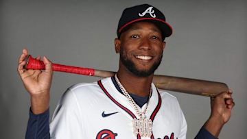 Feb 21, 2025; North Port, FL, USA; Atlanta Braves outfielder Jurickson Profar (7) takes photos during media day CoolToday Park. Mandatory Credit: Kim Klement Neitzel-Imagn Images