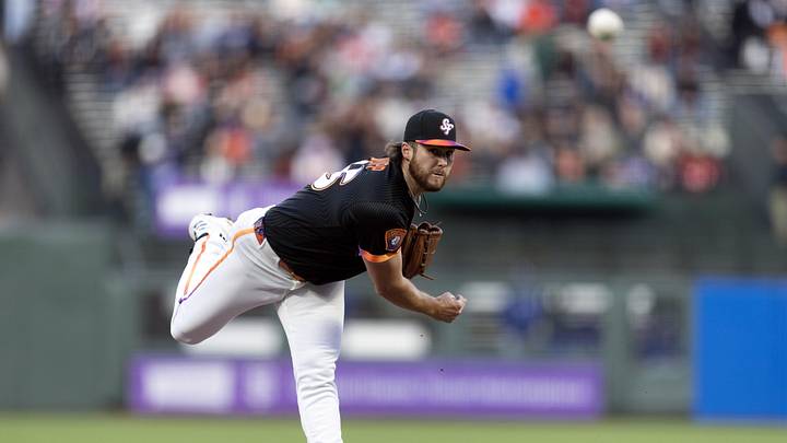 Apr 21, 2026; San Francisco, California, USA; San Francisco Giants starting pitcher Landen Roupp (65) throws against the Los Angeles Dodgers during the first inning at Oracle Park. Mandatory Credit: D. Ross Cameron-Imagn Images