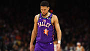Dec 19, 2024; Phoenix, Arizona, USA; Phoenix Suns guard Devin Booker (1) against the Indiana Pacers at Footprint Center. Mandatory Credit: Mark J. Rebilas-Imagn Images