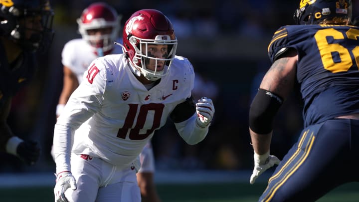 Nov 11, 2023; Berkeley, California, USA; Washington State Cougars defensive end Ron Stone Jr. (10) rushes against California Golden Bears offensive lineman Barrett Miller (right) during the first quarter at California Memorial Stadium. Mandatory Credit: Darren Yamashita-USA TODAY Sports