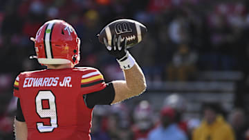 Nov 23, 2024; College Park, Maryland, USA;  Maryland Terrapins quarterback Billy Edwards Jr. (9) throws from the pocket during the first half against the Iowa Hawkeyes at SECU Stadium. Mandatory Credit: Tommy Gilligan-Imagn Images