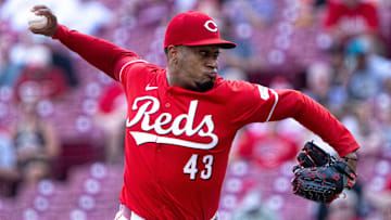 Cincinnati Reds pitcher Alexis Diaz (43) delivers