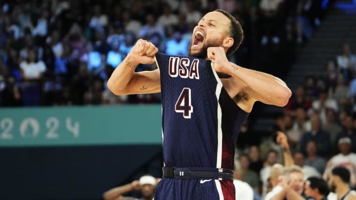 United States shooting guard Stephen Curry (4) celebrates in the second half against France in the men's basketball gold medal game during the Paris 2024 Olympic Summer Games at Accor Arena. Mandatory Credit: