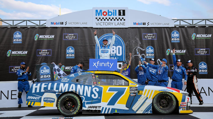 Justin Allgaier scored his 25th NASCAR Xfinity Series victory Saturday at Michigan International Speedway, holding off Sheldon Creed.