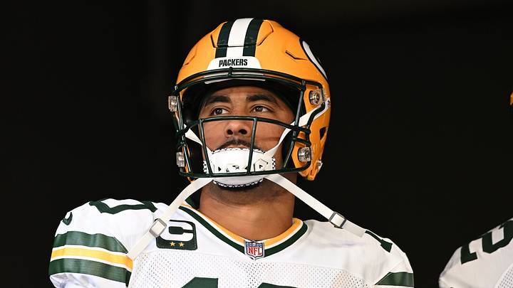 Green Bay Packers quarterback Jordan Love (10) enters the field