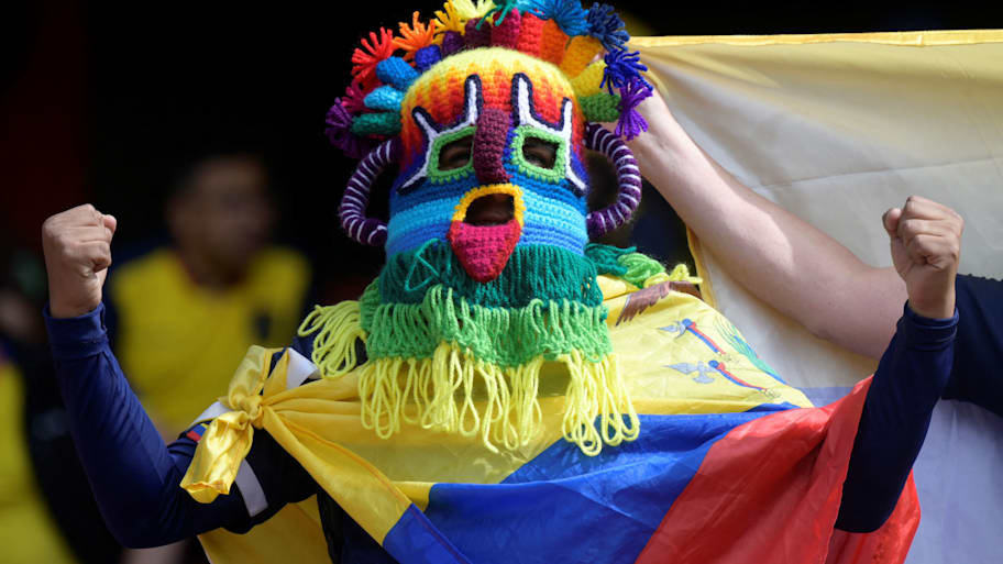 Ecuador fan wearing a Diablo Huma mask. 