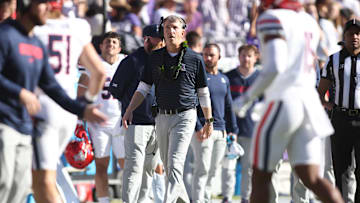 Nov 23, 2024; Fort Worth, Texas, USA; Arizona Wildcats head coach Brent Brennan walks on the sidelines during the game against the TCU Horned Frogs at Amon G. Carter Stadium. Mandatory Credit: Tim Heitman-Imagn Images