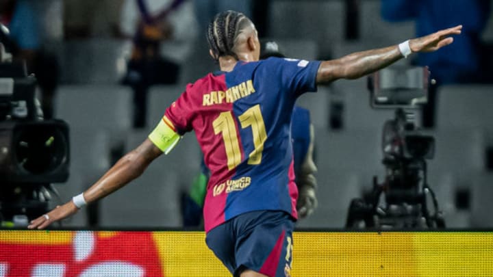 Raphael Dias Belloli "Raphinha" (FC Barcelona) celebrates...