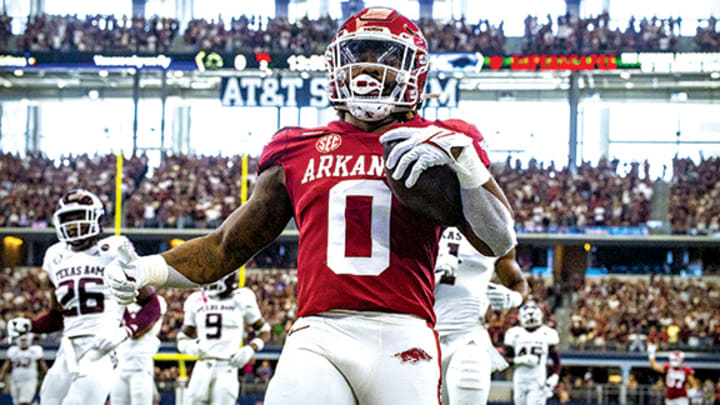 Arkansas running back AJ Green scores a touchdown against Texas A&M in the Southwest Classic at AT&T Stadium in Arlington, Texas.