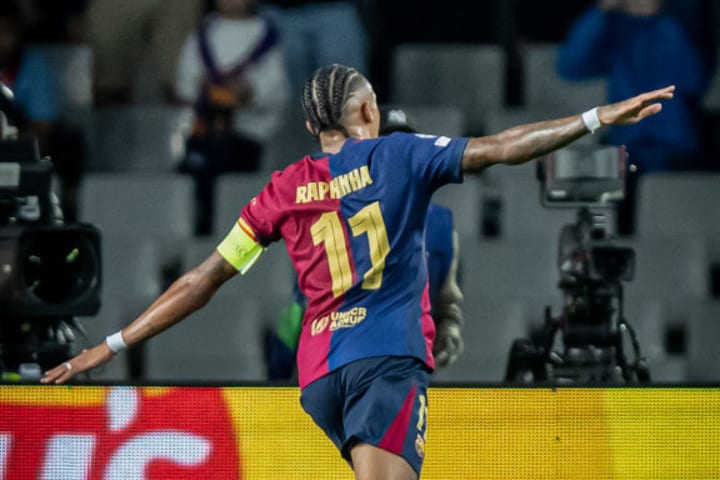 Raphael Dias Belloli "Raphinha" (FC Barcelona) celebrates...