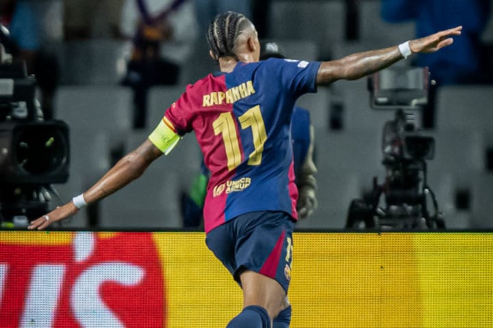 Raphael Dias Belloli "Raphinha" (FC Barcelona) celebrates...