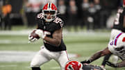 Atlanta Falcons running back Tyler Allgeier (25) carried the ball against the Buffalo Bills during the second half of a game at Mercedes-Benz Stadium.