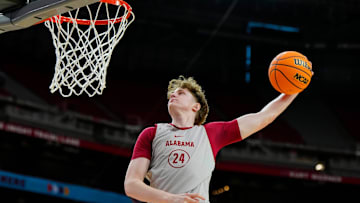 Alabama Crimson Tide forward Sam Walters (24) dunks during practice for the Final Four at State Farm Stadium on Friday, April 5, 2024.