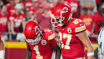 Sep 5, 2024; Kansas City, Missouri, USA; Kansas City Chiefs tight end Travis Kelce (87) celebrates with wide receiver Xavier Worthy (1) after a touchdown against the Baltimore Ravens during the second half at GEHA Field at Arrowhead Stadium. Mandatory Credit: Denny Medley-Imagn Images