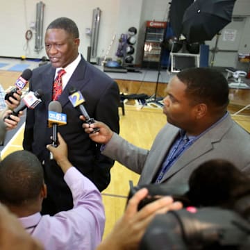 Sep 29, 2014; Atlanta, GA, USA; Atlanta Hawks former player Dominique Wilkins talks to members of the media during the Atlanta Hawks media day at Philips Arena. Mandatory Credit: Jason Getz-Imagn Images