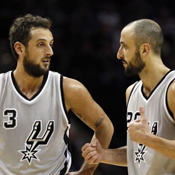 Dec 19, 2014; San Antonio, TX, USA; San Antonio Spurs shooting guard Marco Belinelli (3) talks with Manu Ginobili (20) during the second half against the Portland Trail Blazers at AT&T Center. Mandatory Credit: Soobum Im-Imagn Images