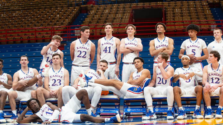 Kansas men's basketball team have fun for a group photo inside Allen Fieldhouse during media day Wednesday.