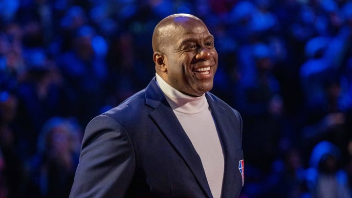 February 20, 2022; Cleveland, Ohio, USA; NBA great Magic Johnson is honored for being selected to the NBA 75th Anniversary Team during halftime in the 2022 NBA All-Star Game at Rocket Mortgage FieldHouse. Mandatory Credit: Kyle Terada-USA TODAY Sports