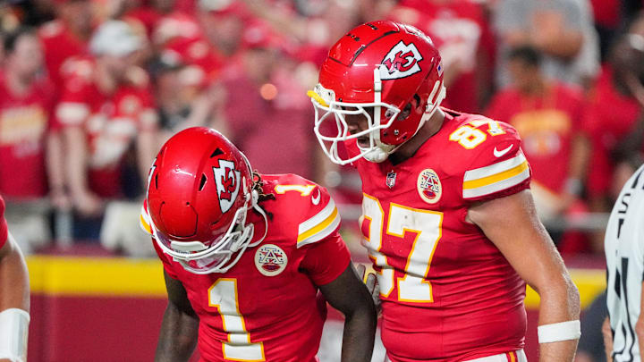 Sep 5, 2024; Kansas City, Missouri, USA; Kansas City Chiefs tight end Travis Kelce (87) celebrates with wide receiver Xavier Worthy (1) after a touchdown against the Baltimore Ravens during the second half at GEHA Field at Arrowhead Stadium. Mandatory Credit: Denny Medley-Imagn Images