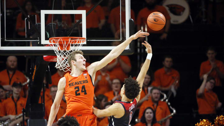 Jan 12, 2020; Corvallis, Oregon, USA; Arizona Wildcats guard Josh Green (0) shoots the ball over Oregon State Beavers forward Kylor Kelley (24) during the second half at Gill Coliseum. Mandatory Credit: Soobum Im-USA TODAY Sports