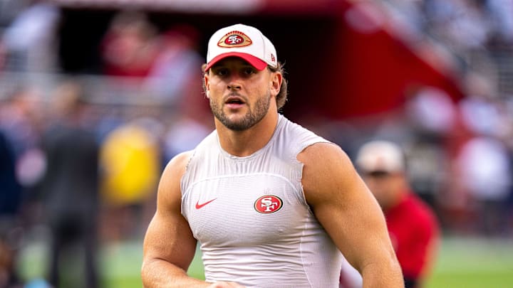 Nick Bosa warming up.