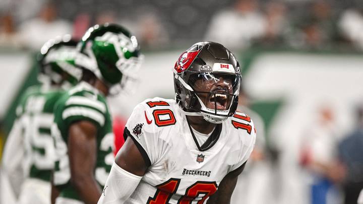 Aug 14, 2026; East Rutherford, New Jersey, USA; Tampa Bay Buccaneers quarterback Jalon Daniels (10) reacts after scoring a touchdown against the New York Jets during the second half at MetLife Stadium. Mandatory Credit: John Jones-Imagn Images