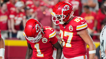 Sep 5, 2024; Kansas City, Missouri, USA; Kansas City Chiefs tight end Travis Kelce (87) celebrates with wide receiver Xavier Worthy (1) after a touchdown against the Baltimore Ravens during the second half at GEHA Field at Arrowhead Stadium. Mandatory Credit: Denny Medley-Imagn Images