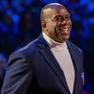 NBA great Magic Johnson is honored for being selected to the NBA 75th Anniversary Team 