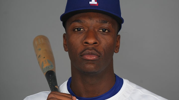 Texas Rangers player Sebastian Walcott poses for a photo during Media Day