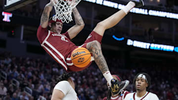 Mar 27, 2025; San Francisco, CA, USA; Arkansas Razorbacks forward Trevon Brazile (4) drives to the hoop past Texas Tech Red Raiders forward Darrion Williams (5) during the second half during a West Regional semifinal of the 2025 NCAA tournament at Chase Center. Mandatory Credit: Kyle Terada-Imagn Images