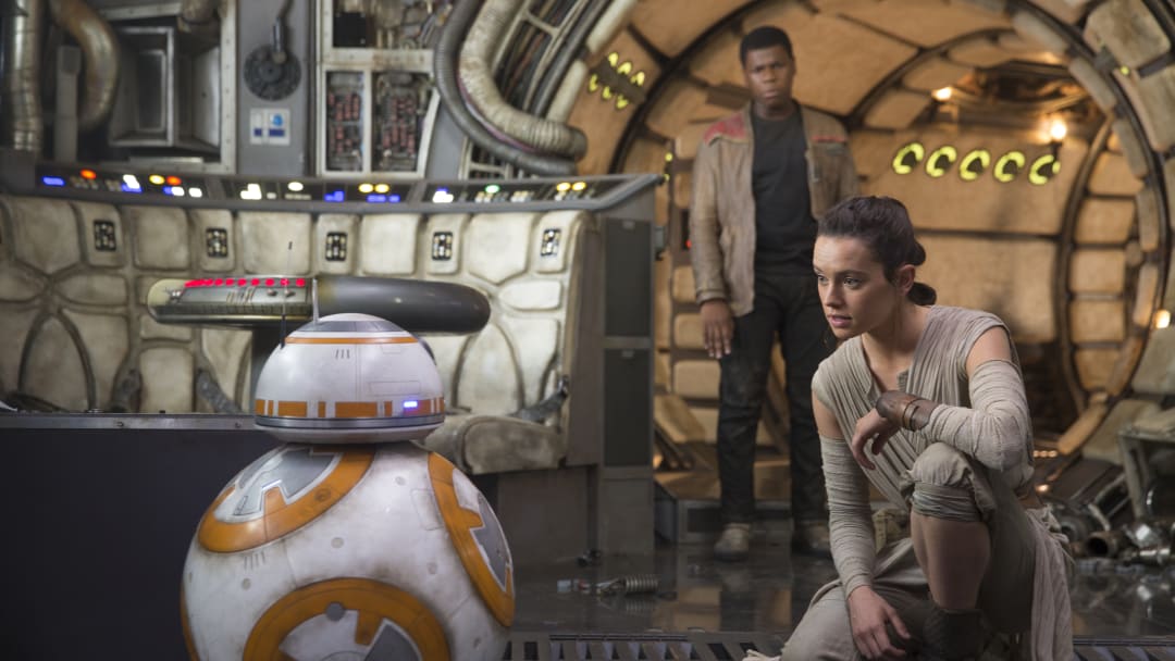 Star Wars: The Force Awakens..L to R: BB-8, Finn (John Boyega) and Rey (Daisy Ridley)..Photo: David James.. ©2016 Lucas Film Ltd. All Rights Reserved. 