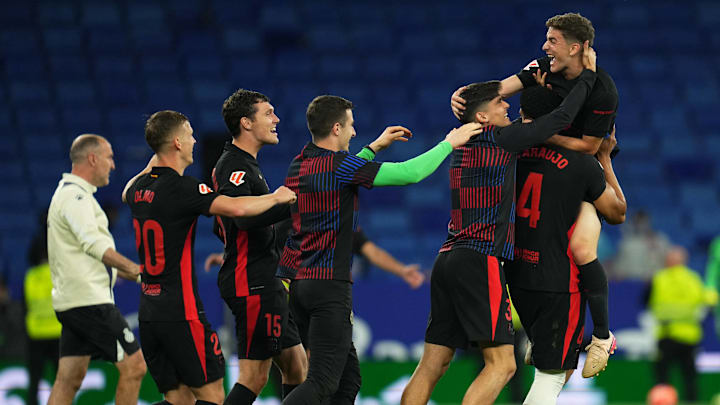Barcelona players celebrate the La Liga title after the final whistle in their victory vs. Espanyol. Barcelona players celebrate the La Liga title after the final whistle in their victory vs. Espanyol.