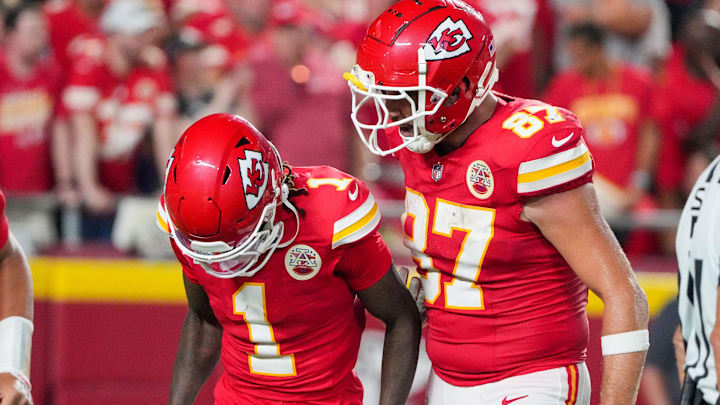 Sep 5, 2024; Kansas City, Missouri, USA; Kansas City Chiefs tight end Travis Kelce (87) celebrates with wide receiver Xavier Worthy (1) after a touchdown agains the Baltimore Ravens during the second half at GEHA Field at Arrowhead Stadium. Mandatory Credit: Denny Medley-Imagn Images