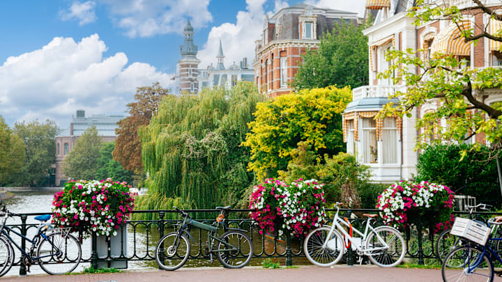 A sunny canal view in Amsterdam, Netherlands.