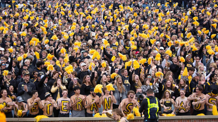 Nov 11, 2023; Columbia, Missouri, USA;  Missouri Tiger fans cheer at the start of the game against Tennessee at Faurot Field at Memorial Stadium. Mandatory Credit: Kylie Graham-USA TODAY Sports