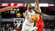 NMSU guard Femi Odukale looks toward the basket during a college basketball game on Thursday, Jan.