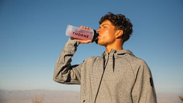Ben Shelton drinking Thorne's Daily Electrolytes.