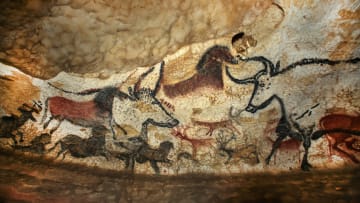 A replica of Paleolithic cave drawings of deer, horses, and aurochs, dating to 15,000 BCE, from Lascaux cave in France.