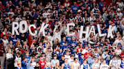Kansas Jayhawks fans throw up paper as the starting lineup is announced in the game against Arizona State Sun Devils inside Allen Fieldhouse Wednesday, Jan. 8, 2025.