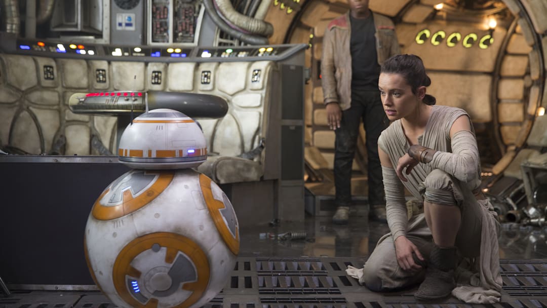 Star Wars: The Force Awakens..L to R: BB-8, Finn (John Boyega) and Rey (Daisy Ridley)..Photo: David James.. ©2016 Lucas Film Ltd. All Rights Reserved. 