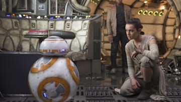 Star Wars: The Force Awakens..L to R: BB-8, Finn (John Boyega) and Rey (Daisy Ridley)..Photo: David James.. ©2016 Lucas Film Ltd. All Rights Reserved. 