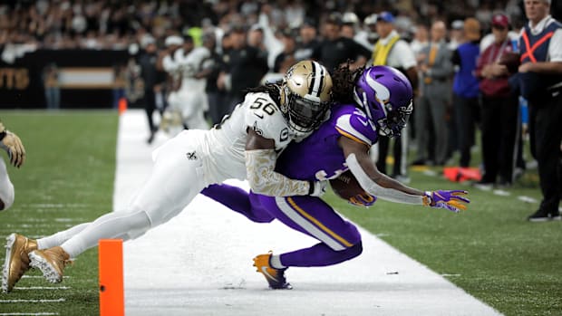 Jan 5, 2020; New Orleans Saints outside linebacker Demario Davis (56) tackles Minnesota Vikings running back Dalvin Cook (33)