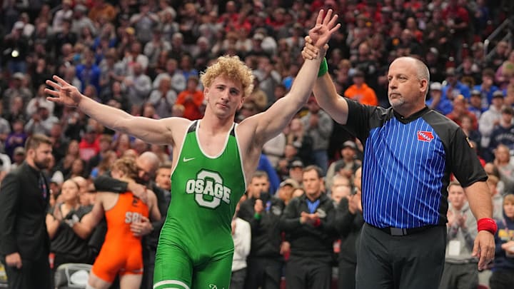 Blake Fox of Osage wrestles Ben Walsh of Sergeant Bluff-Luton in the 150-pound championship match during the Class 2A finals of the Iowa high school state wrestling tournament at the Casey's Center in Des Moines, Feb. 21, 2026. Blake Fox of Osage wrestles Ben Walsh of Sergeant Bluff-Luton in the 150-pound championship match during the Class 2A finals of the Iowa high school state wrestling tournament at the Casey's Center in Des Moines, Feb. 21, 2026.